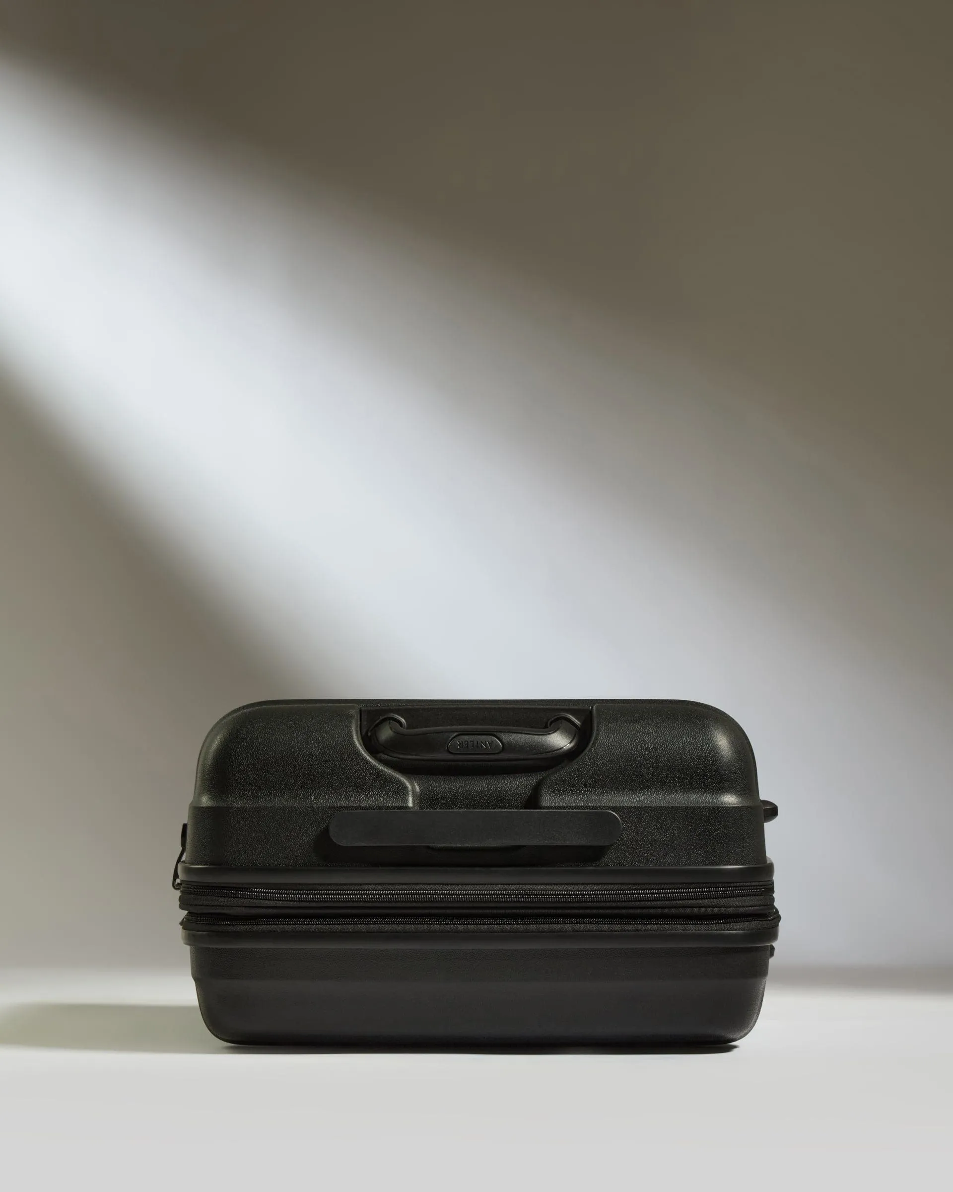 Medium Suitcase in Black - Juno