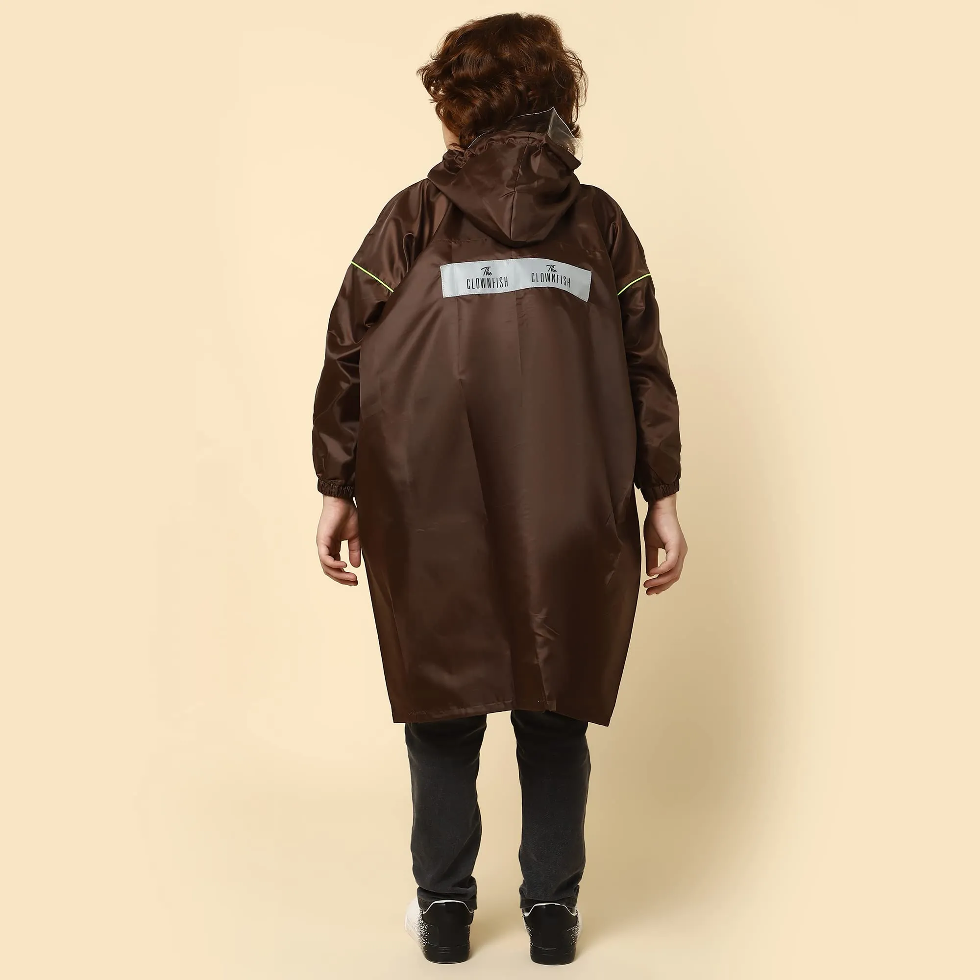 THE CLOWNFISH Oliver Series Kids Waterproof Polyester Double Coating Reversible Longcoat with Hood and Reflector Logo at Back. Printed Plastic Pouch. Kid Age-10-11 years (Brown)